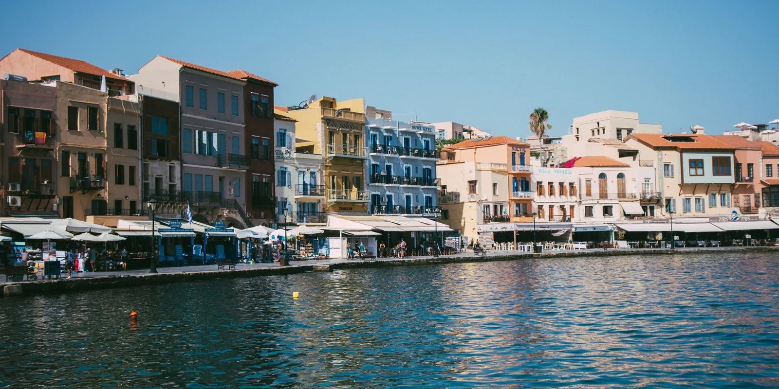 Colourful waterfront buildings at Chania Old Venetian Harbour